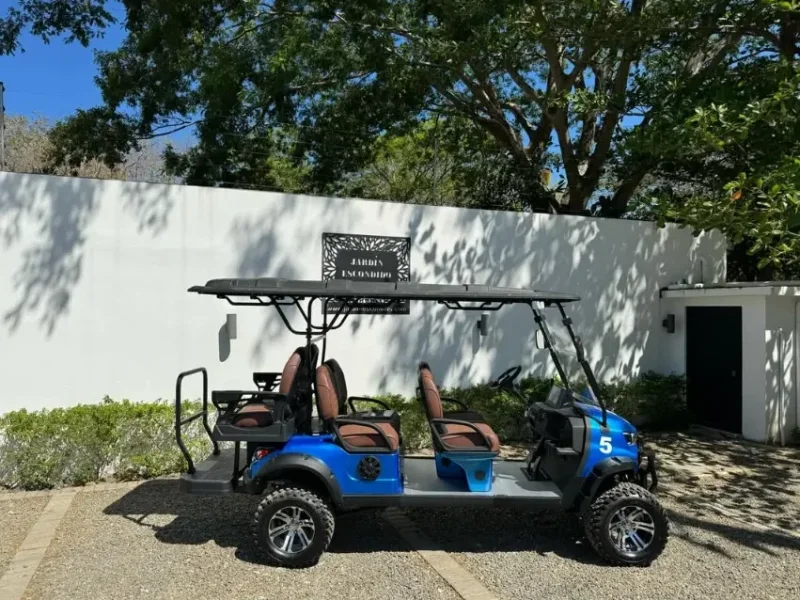 Go Grande six seater golf cart parked at Jardin Escondido in Playa Grande, Guanacaste